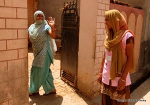 The lady was happy to see the ASHA worker