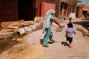 the boy ran as the mother wanted him to pose for me