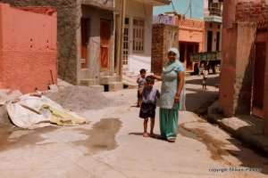 He finally posed and his friend waved from behind